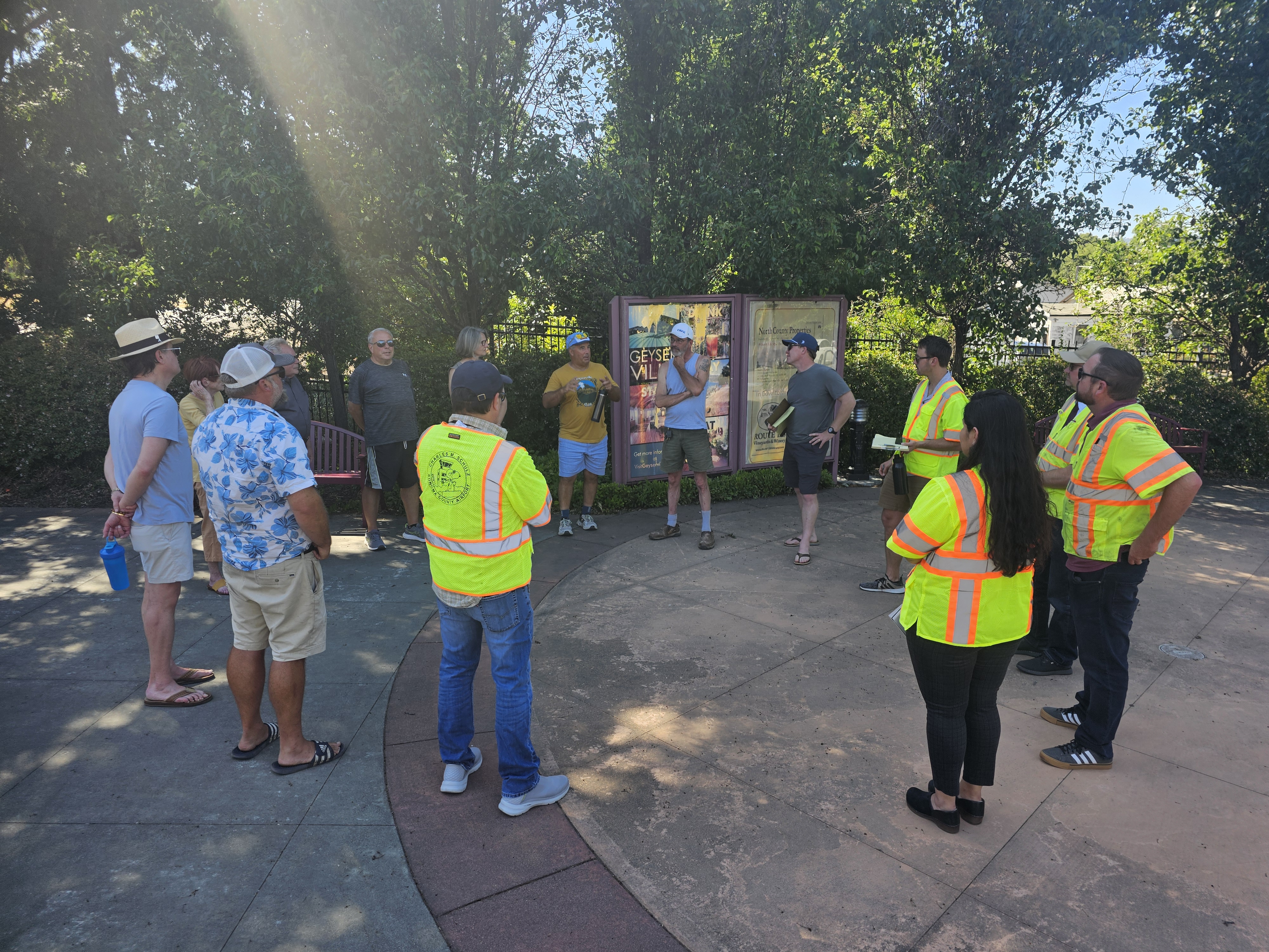 people gather in park for a discussion